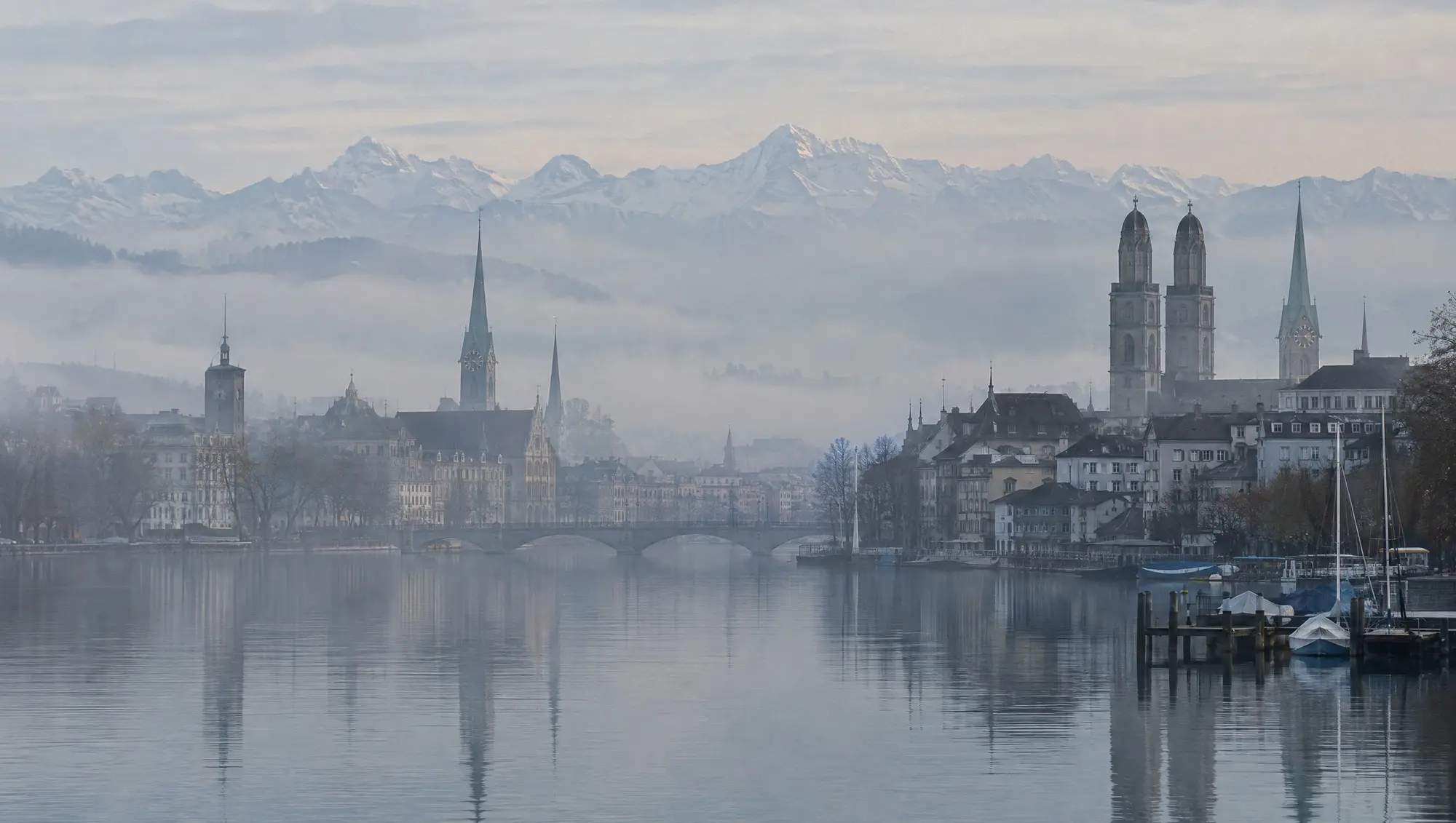 Zurich lake and old town in morning fog